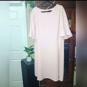 Sheath light pink blush color dress with cold shoulder buttoned sleeves. Size 16